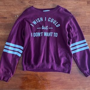 ‘Wound Up’ brand ‘Friends’ maroon crew neck sweater.